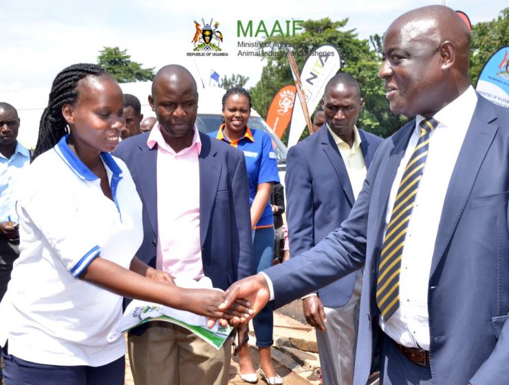 Hon. Sempijja with some of the youth