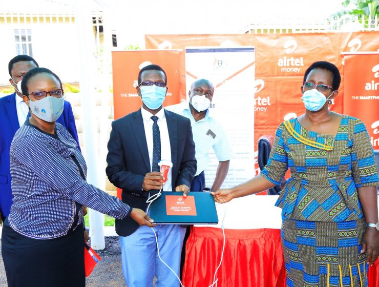 Airtel-Uganda-HR-Director-Flavia Ntambi joins M-Scans-Menyo-Innocent to hand over the Ultrasound device to Ministry of Health P.S Dr. Diana Atwine