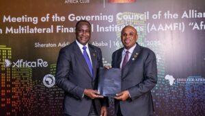 Prof. Benedict Oramah (right), President & Chairman of the Board of Afreximbank, handing over the AAMFI charter to Mr. Samaila Zubairu President and CEO of Africa Finance Corporation (AFC), at the handing over ceremony in Addis-Ababa, Ethiopia